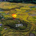 Ziro Valley in Arunachal Pradesh covered with green rice fields and pine trees