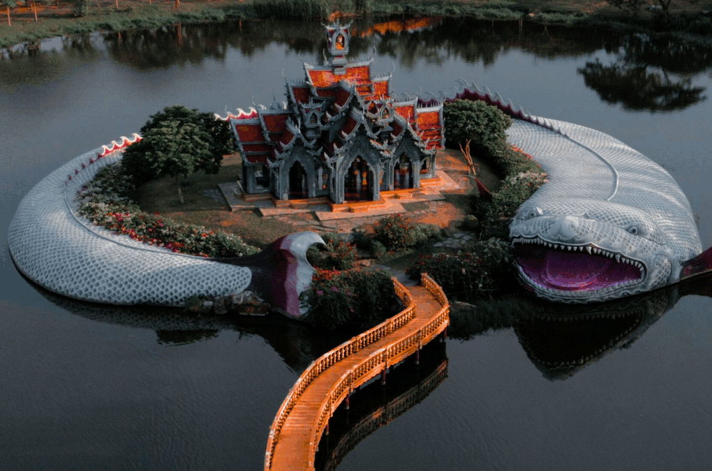 Temple island with giant serpent statue in Thailand – budget backpacking destination 2025